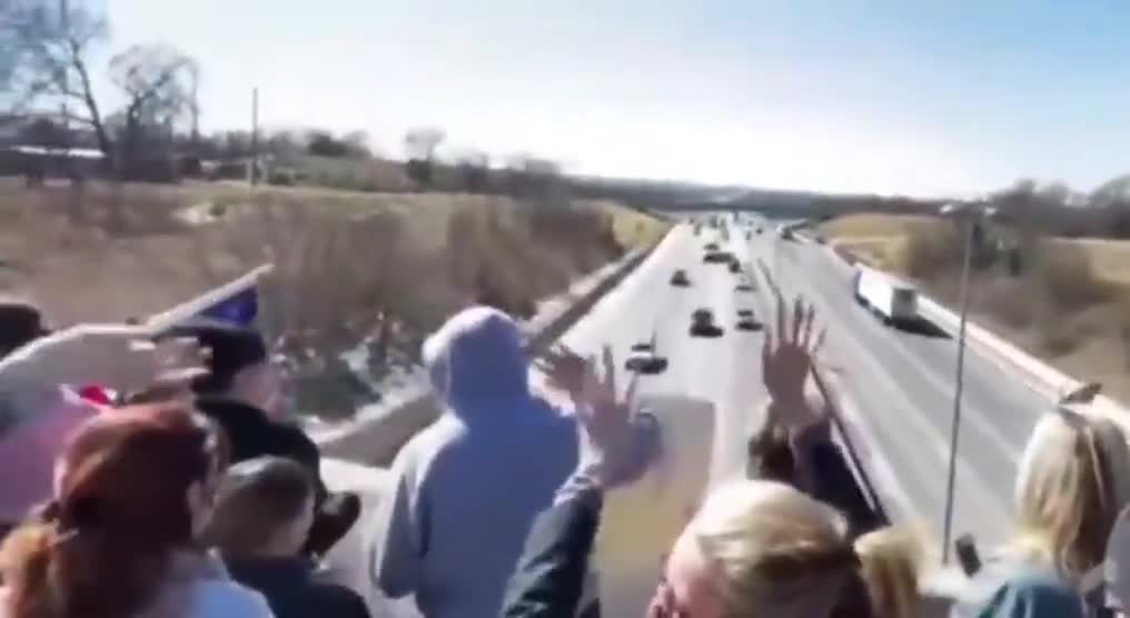 Firefighters & Citizens Gathered on Top of an Overpass to Show Their Support for the People’s Convoy