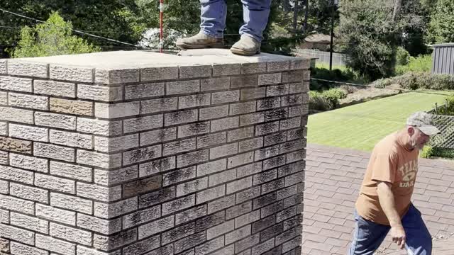 Removing a raccoon from a chimney