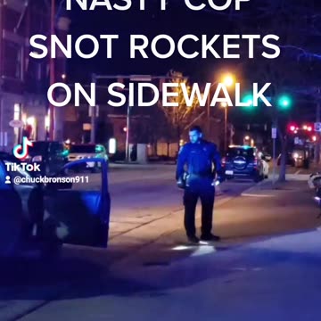 NASTY COP SNOT ROCKETS ON SIDE WASLK DURING TRAFFIC STOP