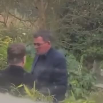 Daniel Andrews seen puffing a cigarette outside function