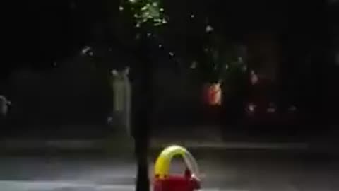 This car on the street during a storm in Mexico