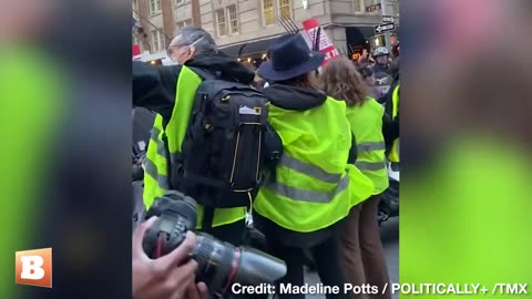 "Tax the rich!" was the chant of leftist protestors who lay in the street at an intersection in NYC