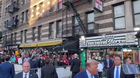 Harlem crowd spontaneously sings the Star-Spangled Banner during Trump appearance.