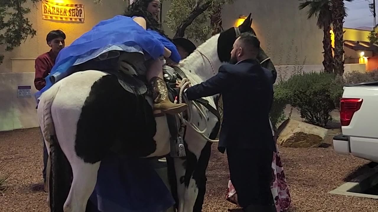 Quinceañera gets on a Horse