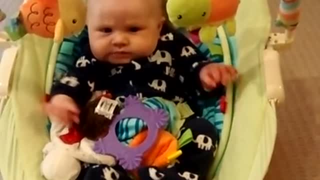 Baby adorably fails at trying to appear angry