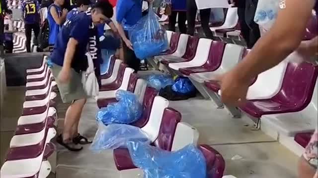 Japan fans clean up stadium after historic win over Germany