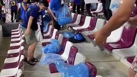 Japan fans clean up stadium after historic win over Germany