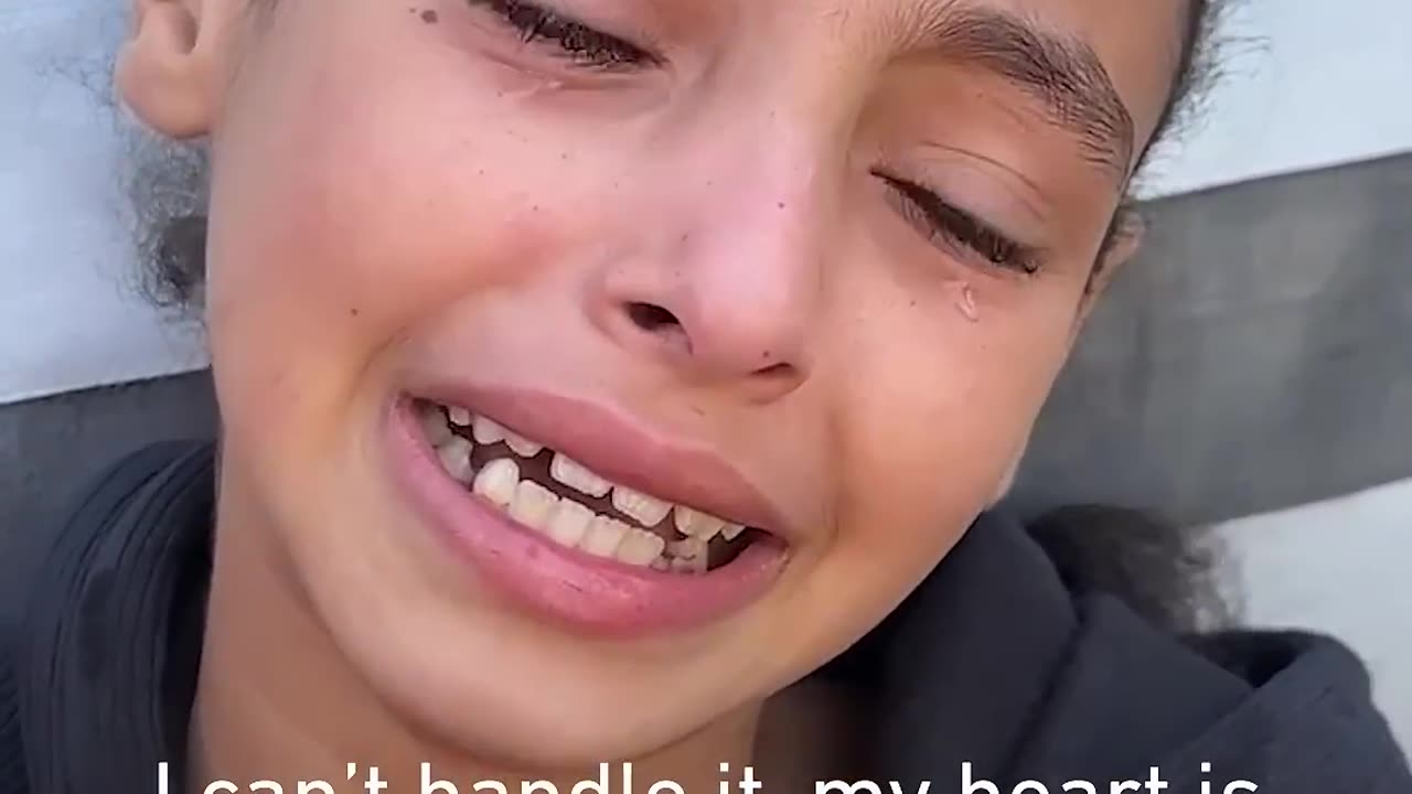 Palestinian girl in tears after her uncle was killed in Israeli strike on Rafah