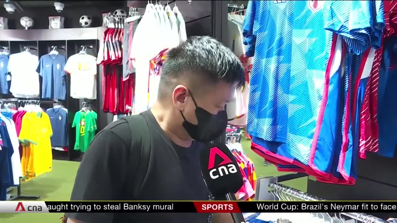 World Cup fever hit Japanese, Korean shops in Singapore