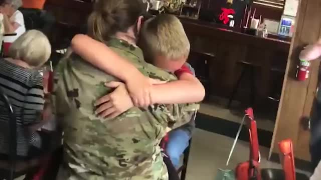 Kids welcoming their Miltary Parents