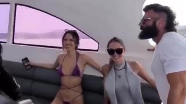 Dan Bilzerian with girls enjoying the high speed boat ride