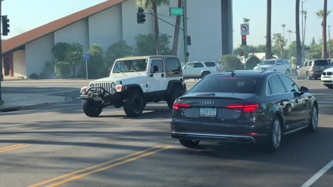 Driverless Car Encircles Churchfront Intersection