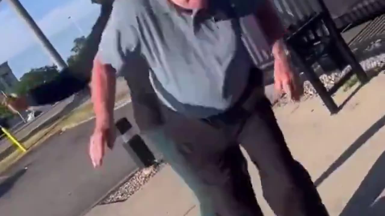 White older man hitting black woman...