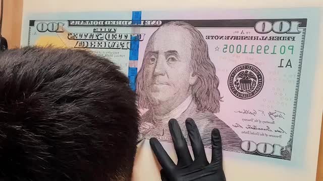 WAD THE BUCK? Artist's Lifelike US Dollars Draw Police Interest