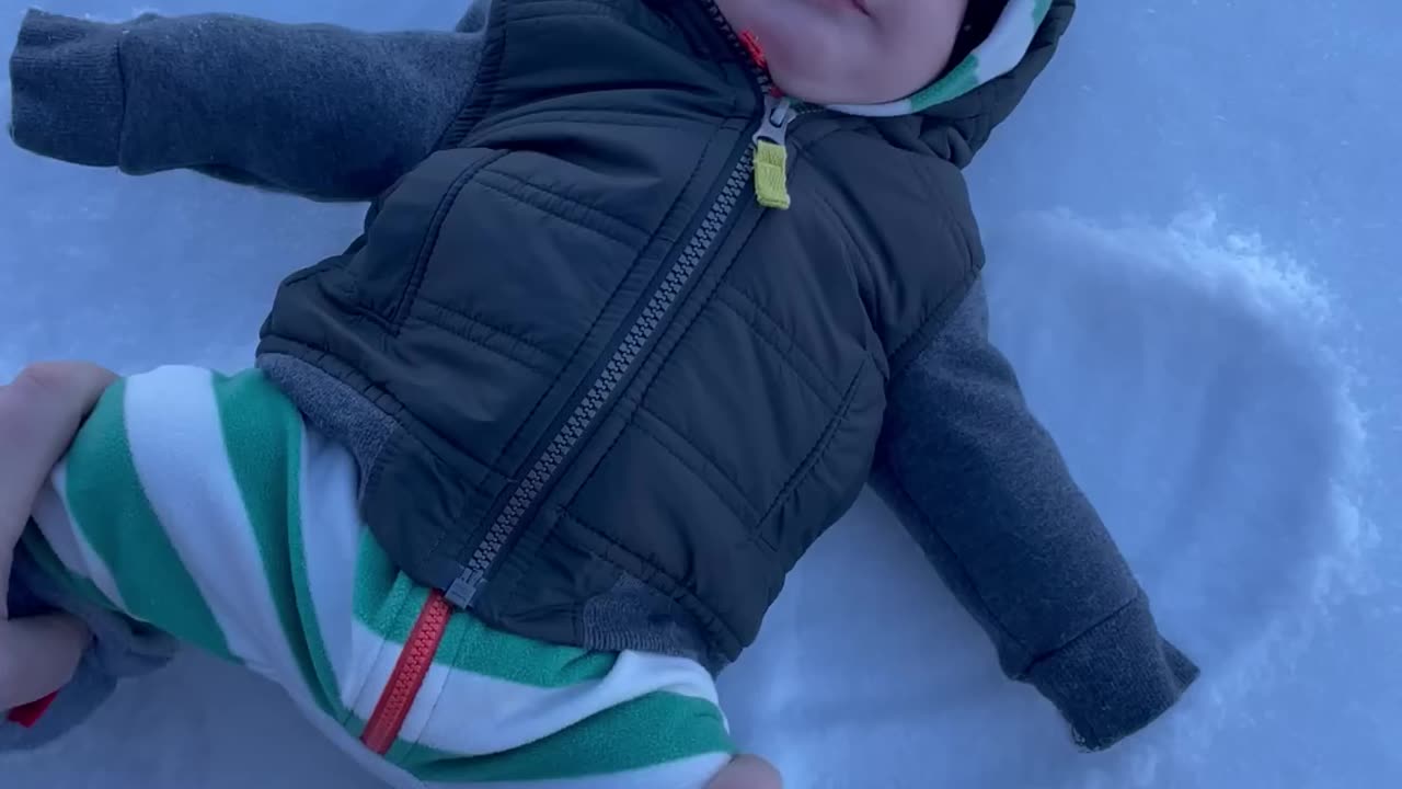 Cute baby snow angel