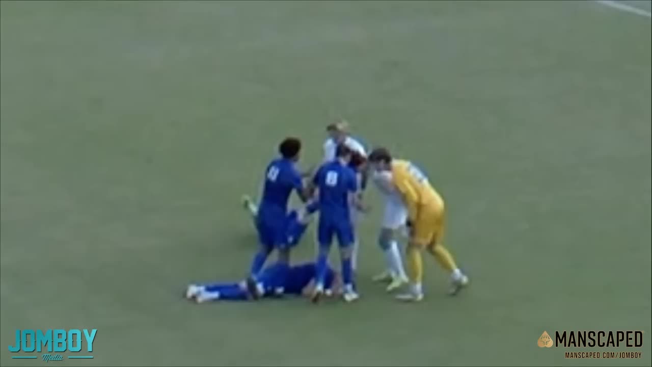 SOCCER PLAYER MOCKS GOALIE