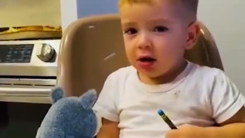 The baby slowly stopped smiling