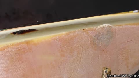Yummy Swiss Raclette. Warm Melted Swiss Cheese with Egg and Potatoes. London Street Food