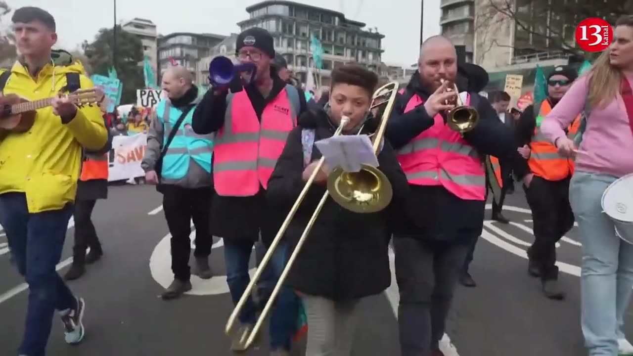 'Paid a pittance': UK teachers, parents and kids march over pay and conditions