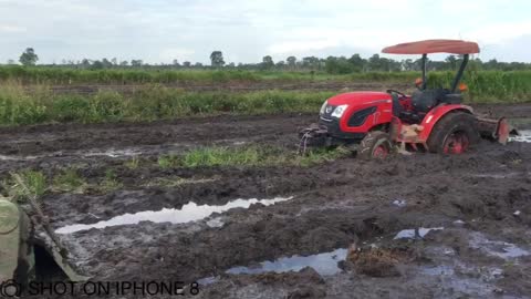 Tractor in deep mud