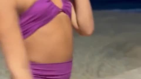 in beach she is so cute to us