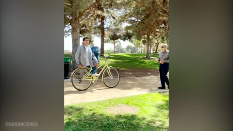 MAN CUT IN HALF ON A BIKE