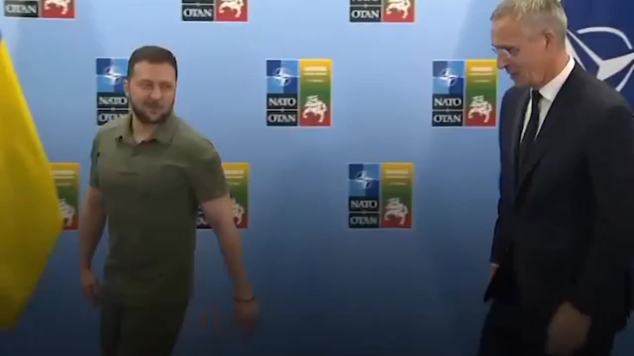 Stoltenberg and Zelensky shake hands, pose for photographs at NATO summit in Vilnius