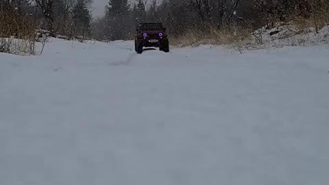 1836# Jeep playing in the snow after plowing snow