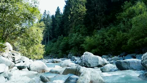 A River Flowing Through Rocks Formation