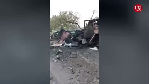 All burned to ashes...Russians parade convoy of trucks destroyed by HIMARS