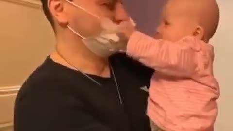 Baby finds masking hilarious