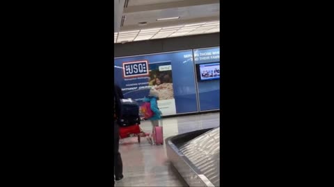 Dad Drags Daughter Through Airport