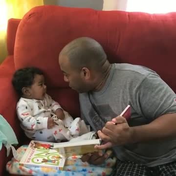 Sweet Baby Can't Stop Giggling When Dad Reads Stories
