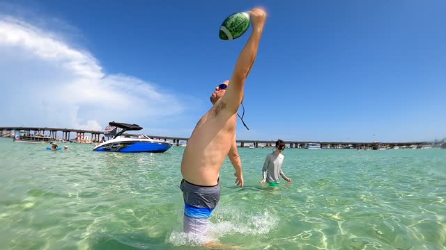 Throwing the Football at Crab Island With my Brother