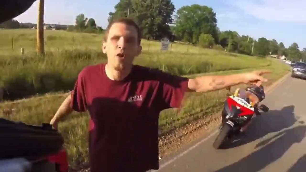 biker almost gets hit by dude and get instant Karma