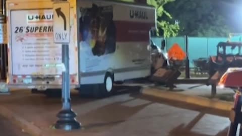 Police detained the driver of a box truck on Monday night after the vehicle crashed into security