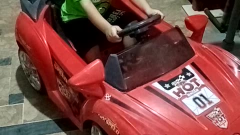 Little boy car driving