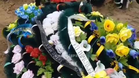 Images from a Ukrainian cemetery, where they are digging pits non-stop.