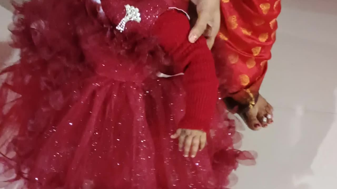 One year old baby girl dancing