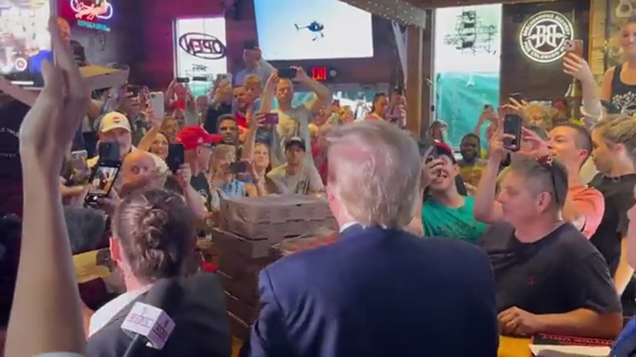 Trump Serves Fans Pizza