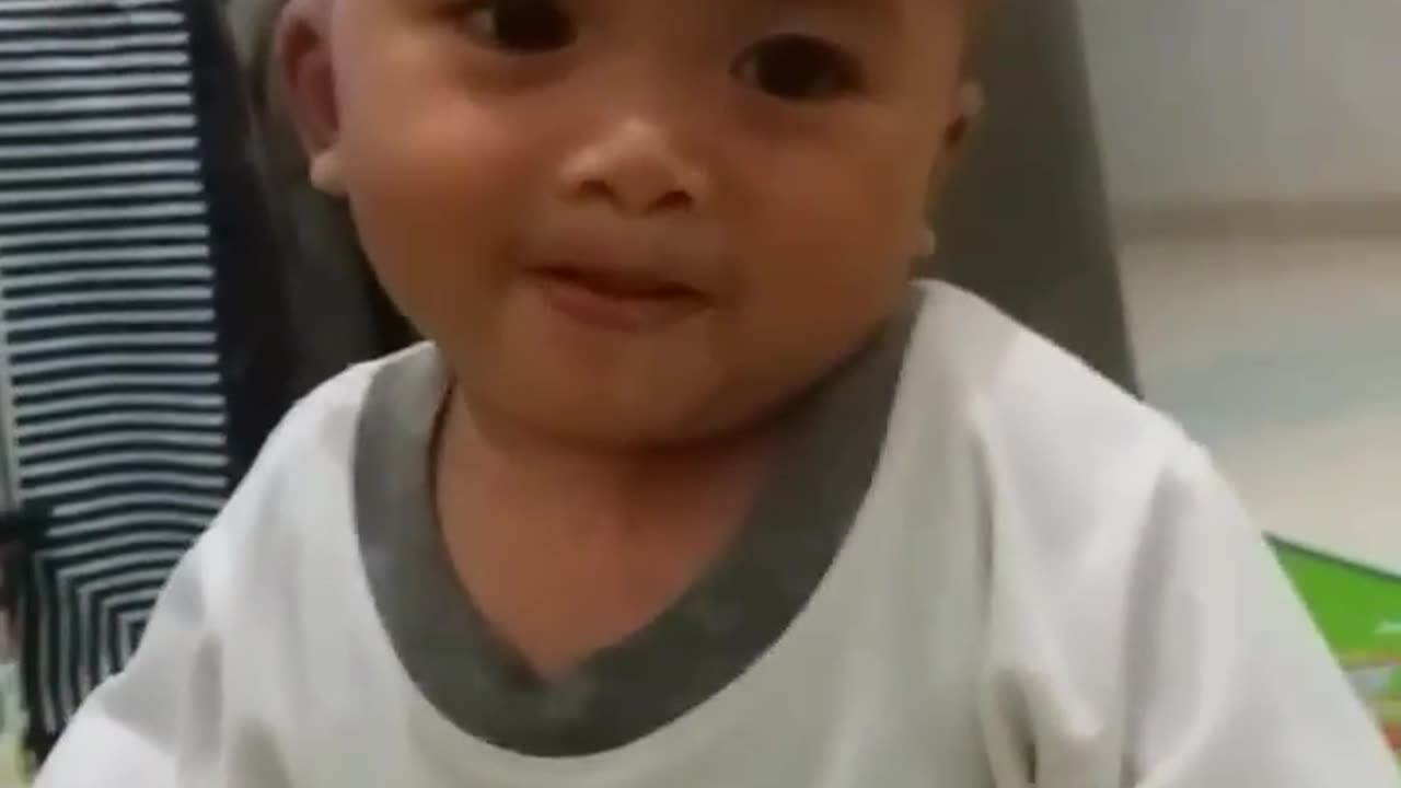 Funny Baby With The Bottle