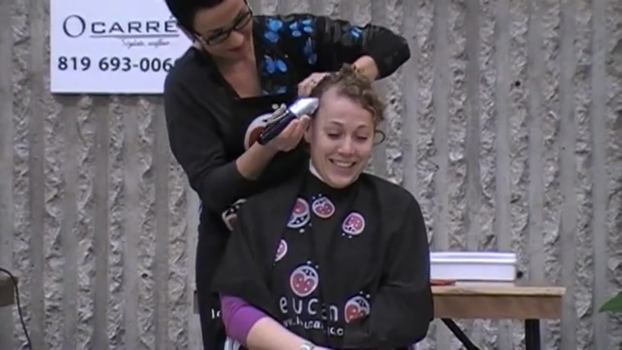 Two woman shave her head at same time