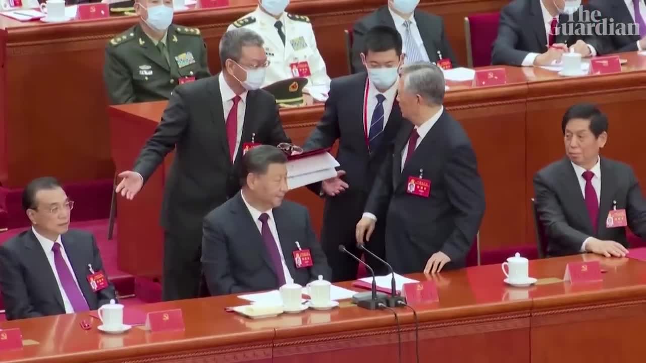 Former Chinese president Hu Jintao unexpectedly led out of party congress