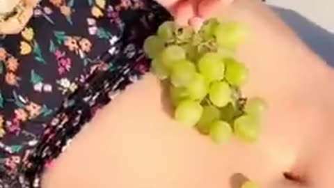 RUCHI SINGH: FEEDING HERSELF GRAPES