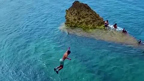 swimming jumping in ocean ......