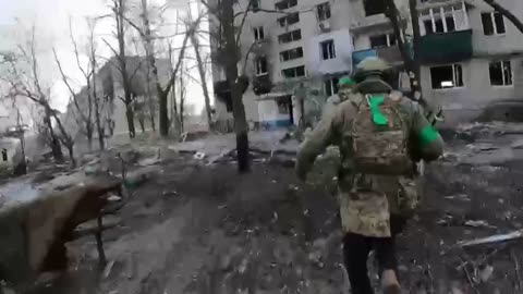 Ukrainians Moving Through the Ruins of Bakhmut