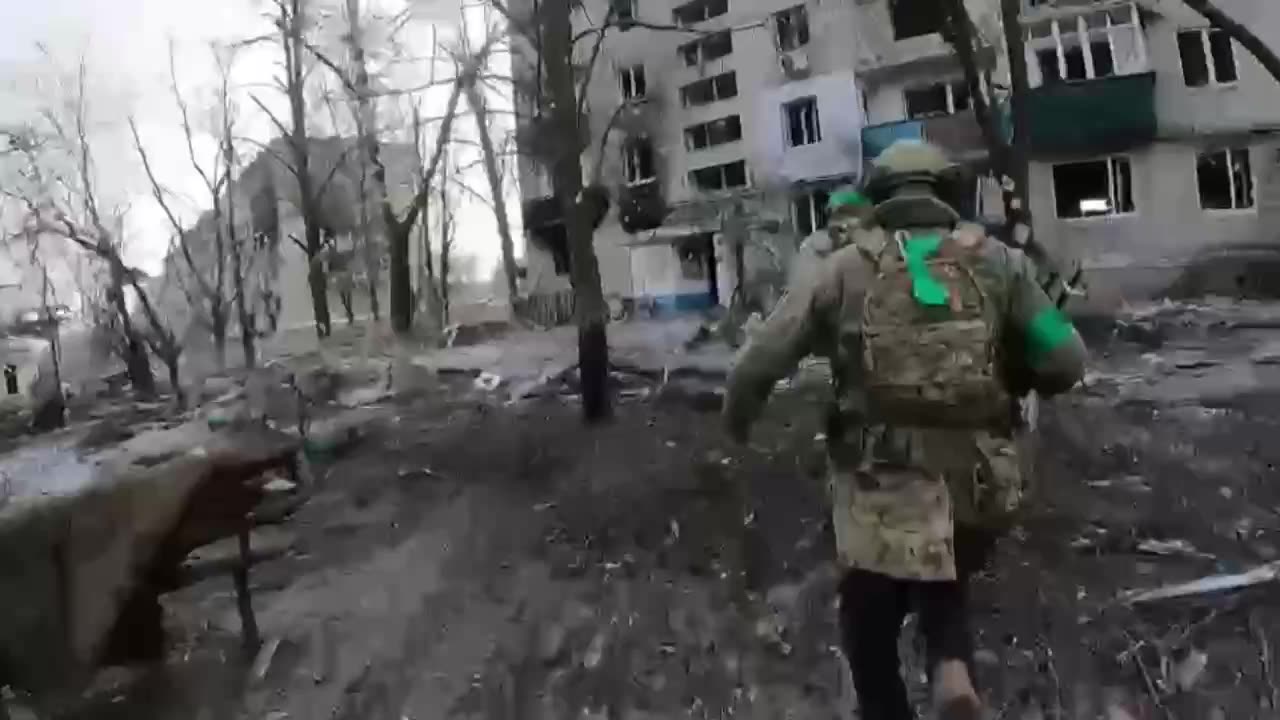 Ukrainians Moving Through the Ruins of Bakhmut