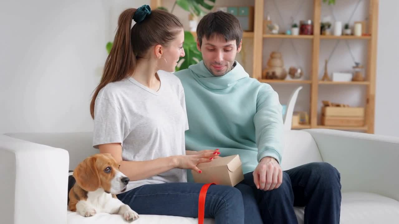 Young family couple with dog