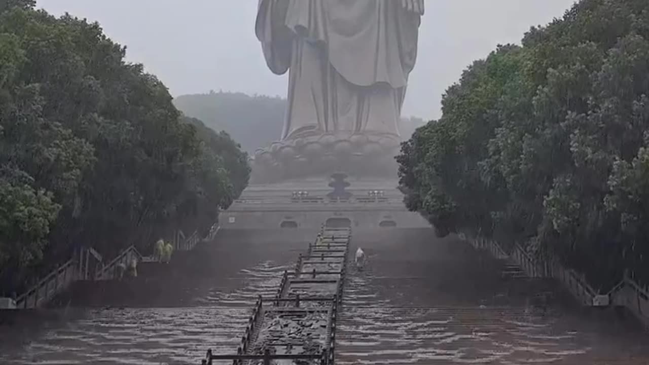 Standing in awe at the Wuxi Giant Buddha