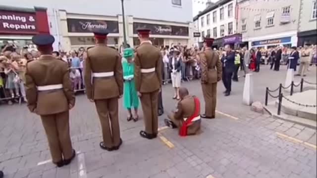 Queen Guard “Fell Down ” During Her Visit!